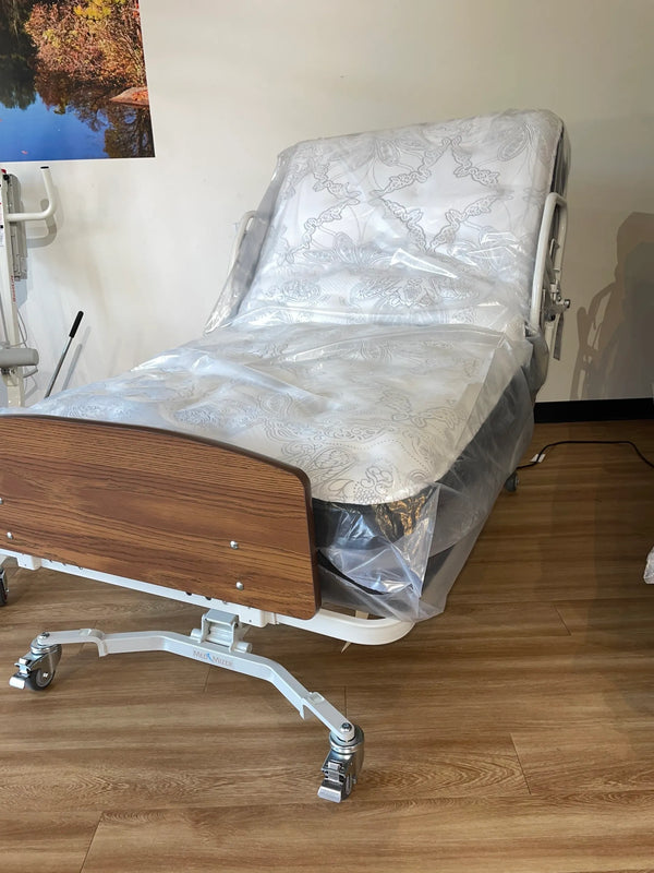 MedMizer Retract V hi-low hospital bed with a premium mattress